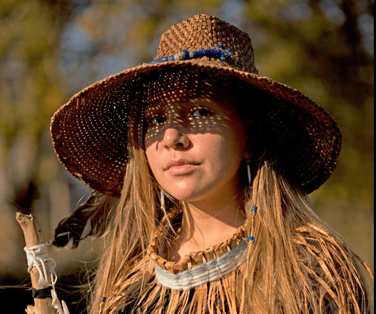 girl in woven hat image