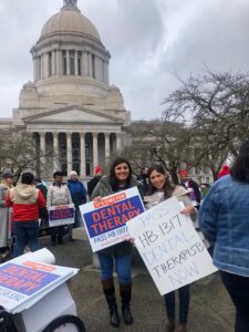 photo of people in front of capital building