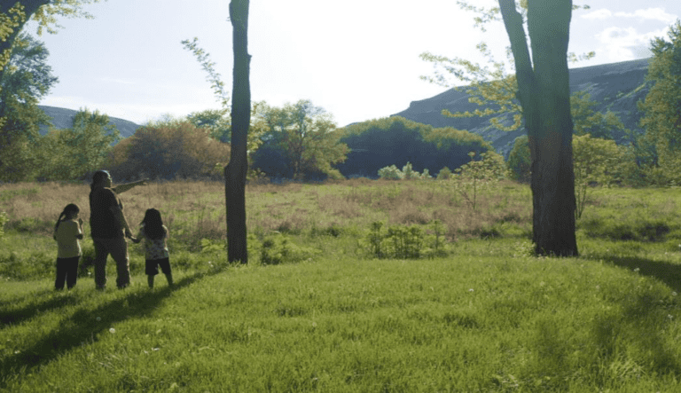 A Native American family on a nature walk.