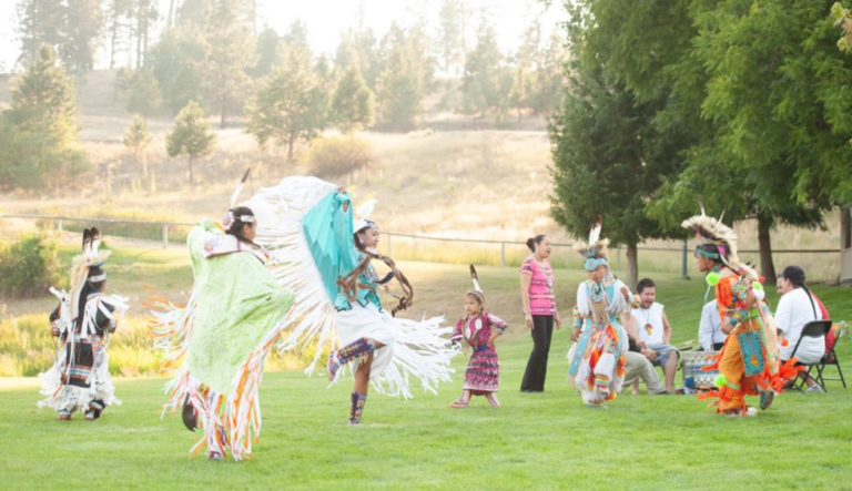 Native people performing a traditional dance